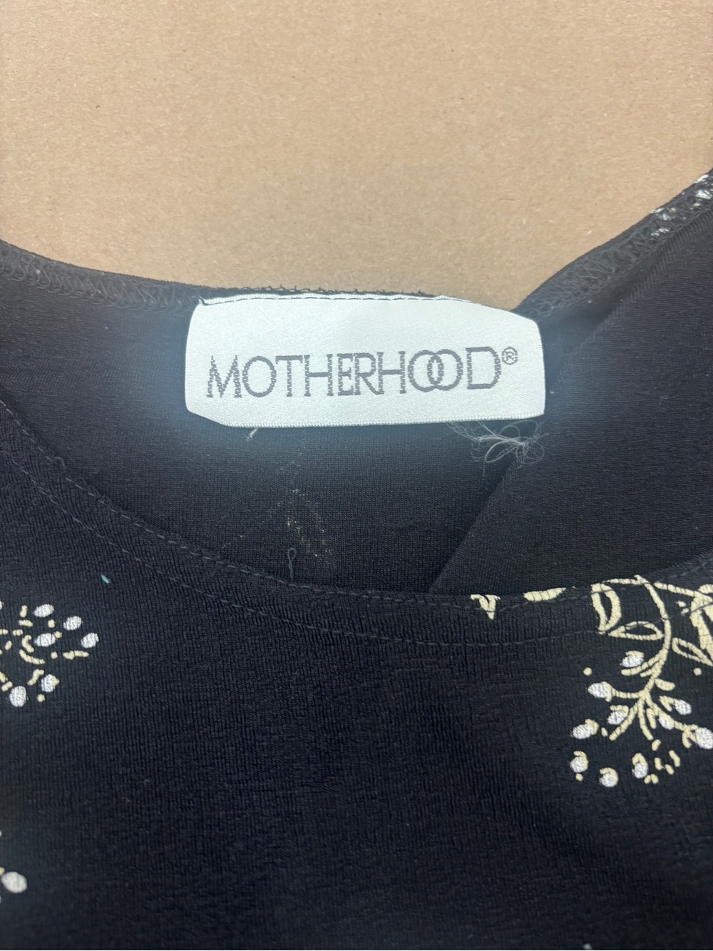 Motherhood Black Top with Cream Floral Trim